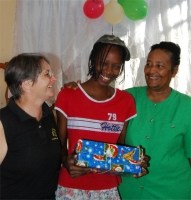Orphan in the Bon Repos orphanage receiving their Make Jesus Smile shoeboxes